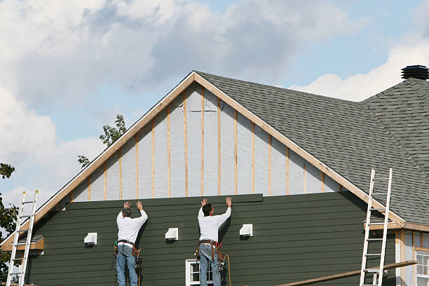 Professional Storm Damage Siding Repair technician working in Atlantic Beach, NC